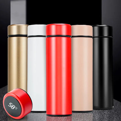 Man displaying the LED Temperature Display Thermos Bottle while cycling, conveying active lifestyle.