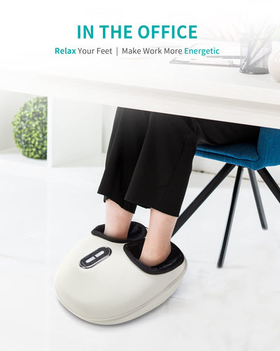A serene workspace featuring the Nekteck Shiatsu Foot Massager providing deep tissue foot therapy during work breaks.