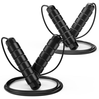 Fitness enthusiasts using a tangle-free jump rope during a home exercise session for strength and weight loss.