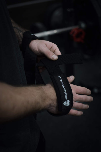 Gymreapers lifting wrist straps featuring increased length for improved support and grip during heavy lifts.
