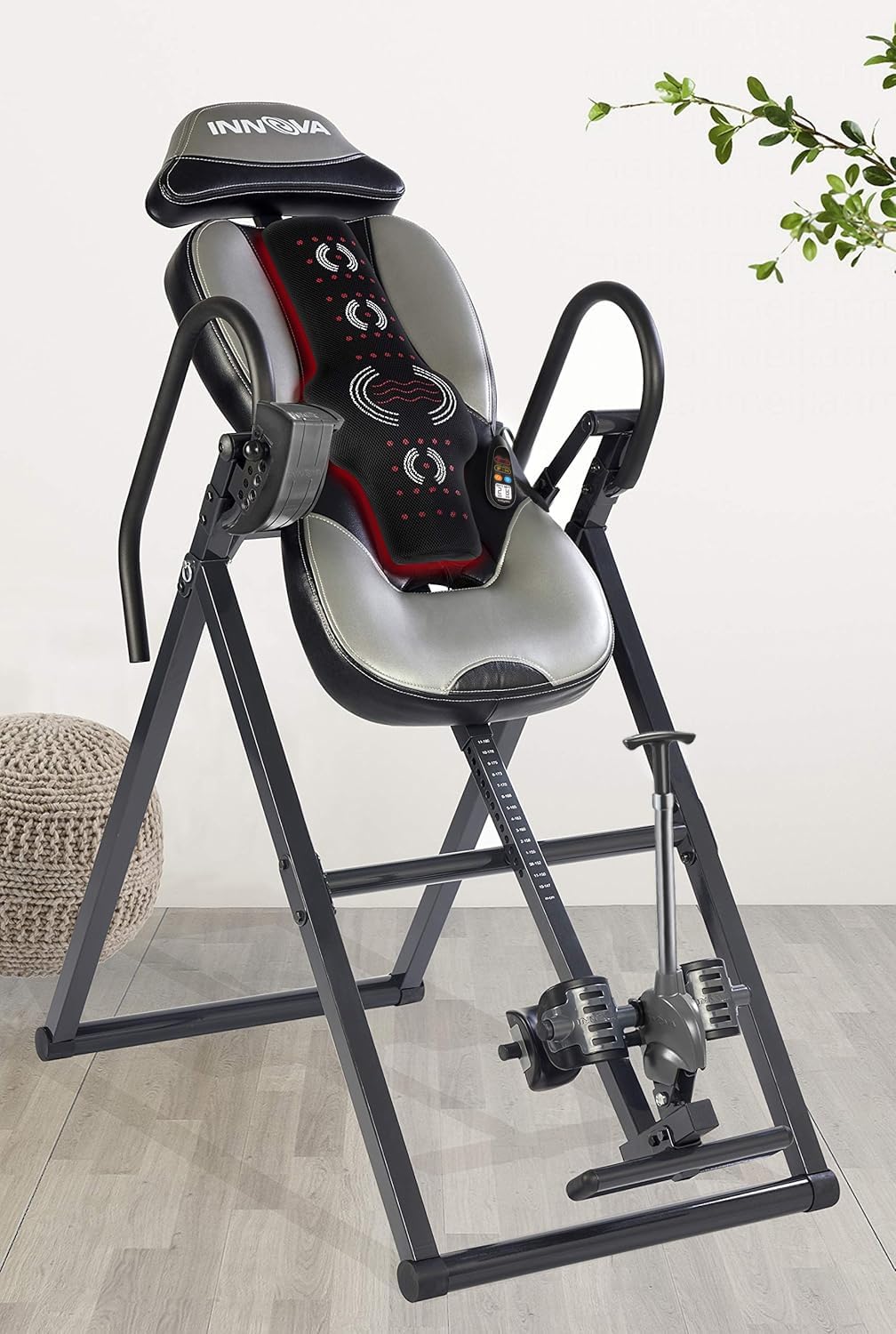 Lifestyle image featuring the INNOVA heat and massage inversion table in use, promoting wellness and relaxation.