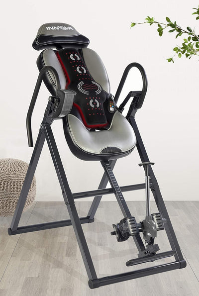 Lifestyle image featuring the INNOVA heat and massage inversion table in use, promoting wellness and relaxation.