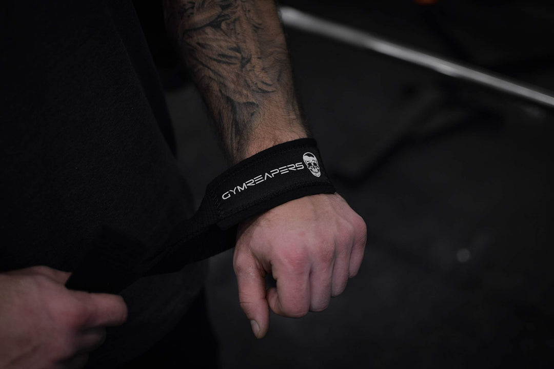 Athlete using Gymreapers weightlifting wrist straps during a powerlifting session, highlighting their effectiveness.