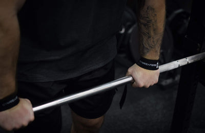Gymreapers padded weightlifting wrist straps designed to eliminate grip fatigue during heavy lifting.