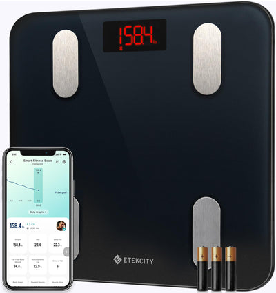 User analyzing weight fluctuations using the Etekcity Smart Scale for Body Weight, emphasizing the Bluetooth body composition scale features.