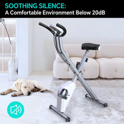 Convenient phone holder on a foldable exercise bike for entertainment during workouts.