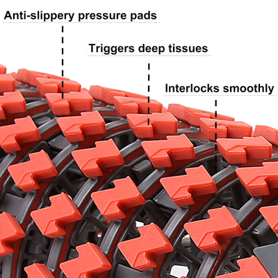 Collapsible foam roller placed next to a yoga block, highlighting its versatility for different types of exercise.