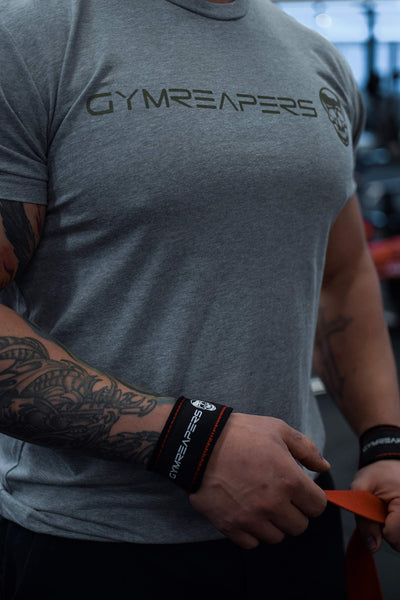Weightlifting wrist straps by Gymreapers designed to maximize efficiency during deadlifts and heavy lifting.