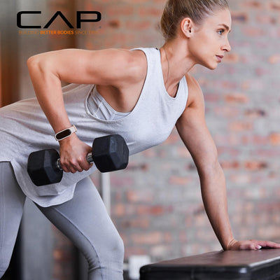 Engaging workout session featuring CAP Barbell hex dumbbells with rack.