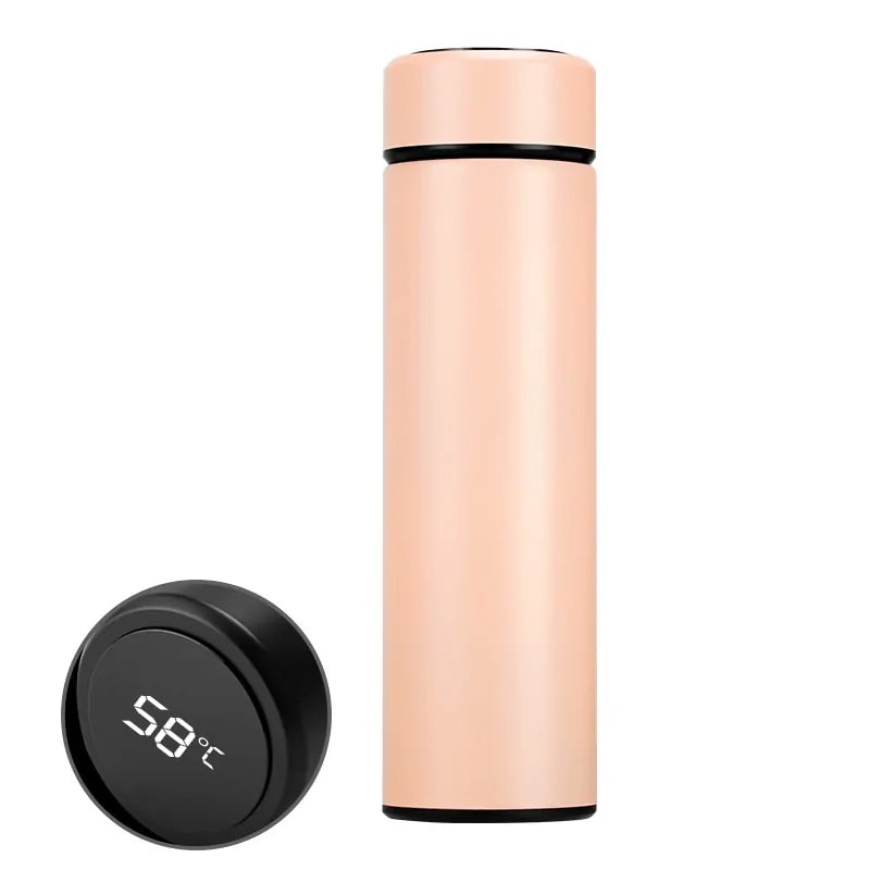 A group of friends sharing drinks from the LED Temperature Display Thermos Bottle during a picnic.